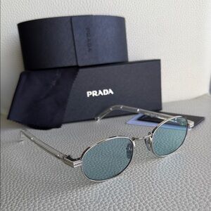 Prada Silver Frames with Green Lenses